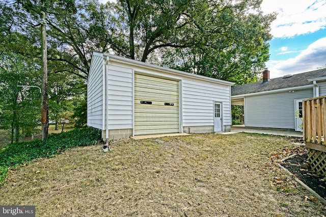 view of outdoor structure featuring a yard