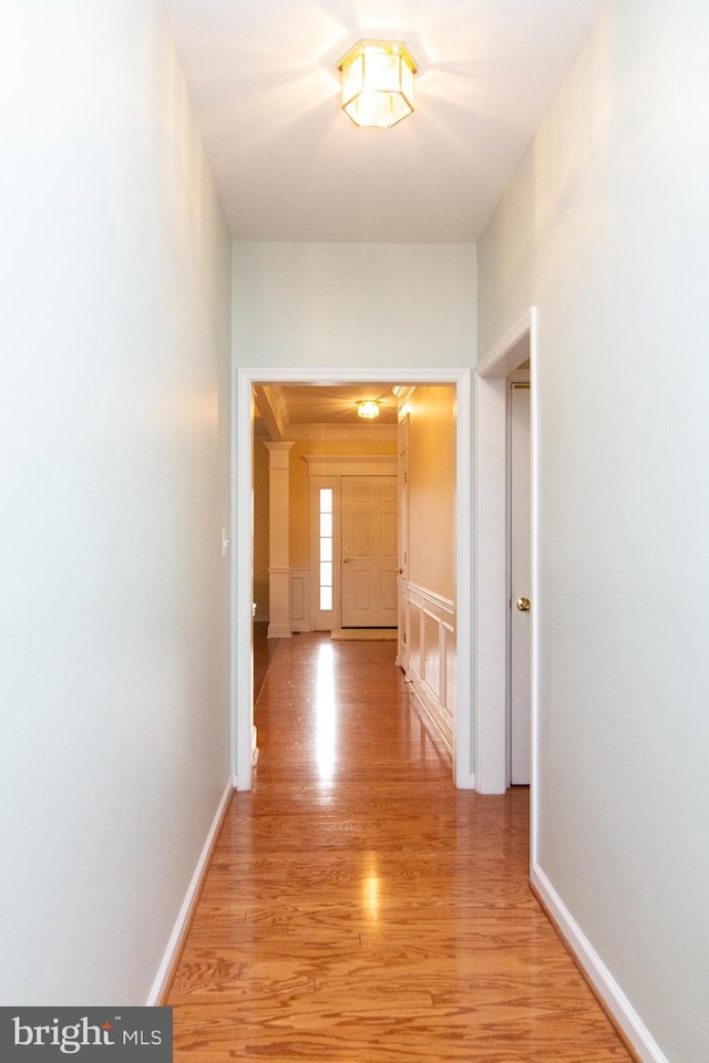 corridor featuring light hardwood / wood-style floors