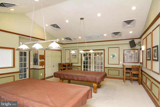 rec room featuring lofted ceiling, crown molding, light colored carpet, and billiards