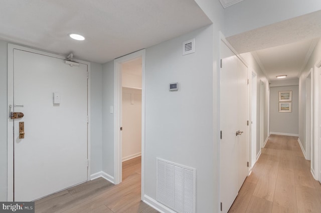 hall featuring light hardwood / wood-style flooring