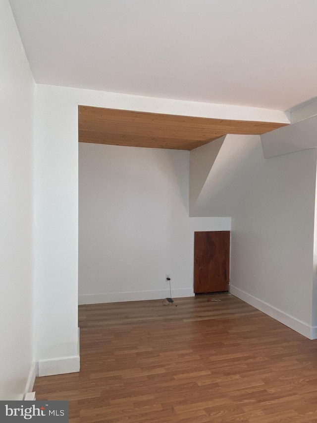 unfurnished room featuring hardwood / wood-style flooring