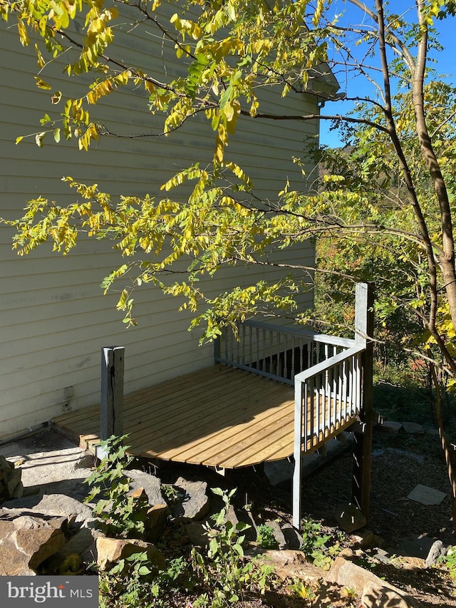 view of home's exterior with a deck