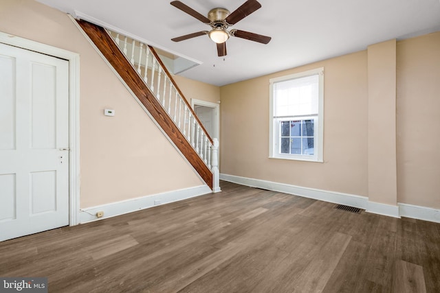 interior space featuring hardwood / wood-style floors and ceiling fan