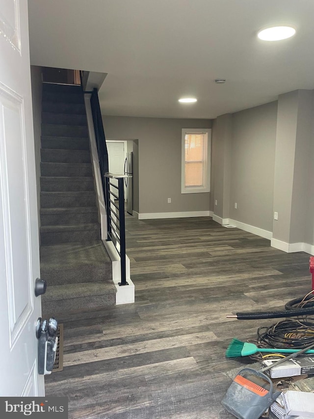 interior space with dark wood-type flooring