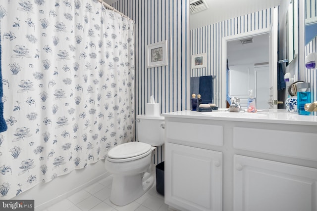 full bathroom with vanity, shower / tub combo, toilet, and tile patterned flooring