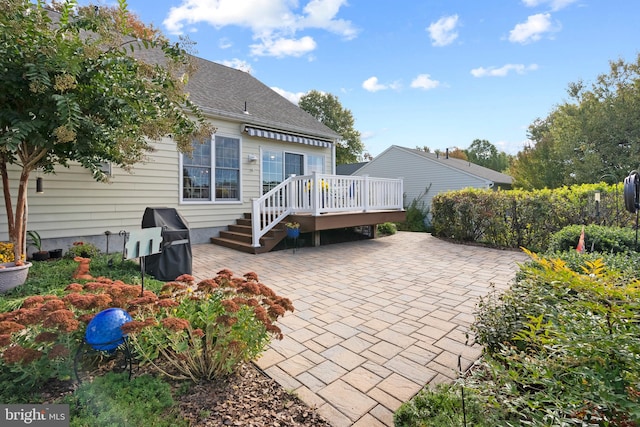 back of property featuring a patio