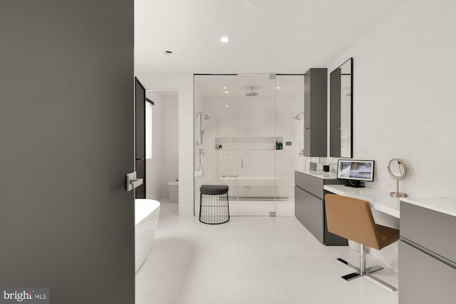 bathroom with tile patterned flooring, an enclosed shower, vanity, and toilet