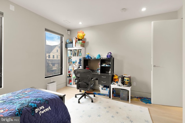 bedroom featuring light hardwood / wood-style flooring