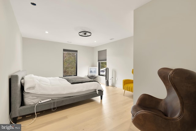 bedroom with light hardwood / wood-style flooring