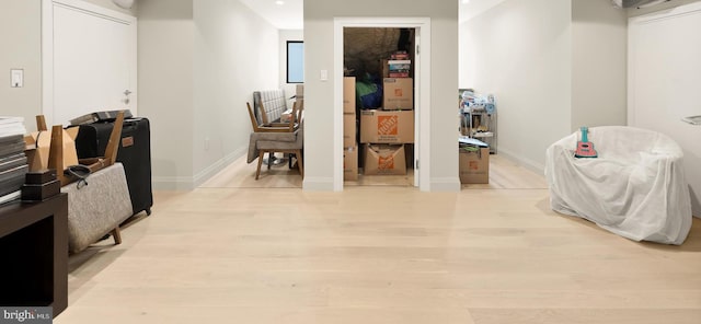 hallway featuring light hardwood / wood-style flooring