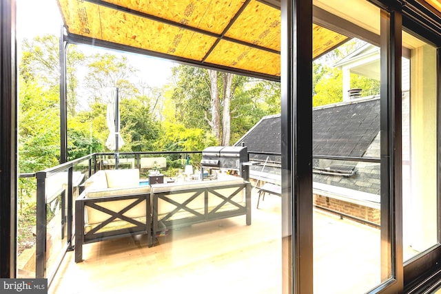 unfurnished sunroom featuring plenty of natural light