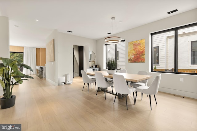 dining area featuring light hardwood / wood-style floors