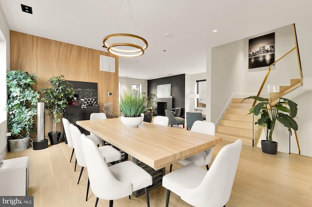 dining room featuring light hardwood / wood-style flooring