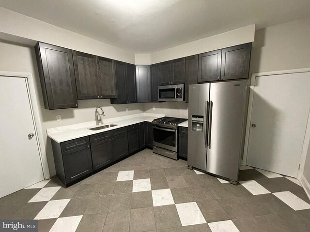 kitchen with sink and stainless steel appliances