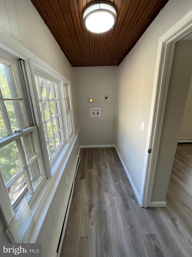 washroom with baseboard heating, wood ceiling, washer hookup, and dark hardwood / wood-style flooring