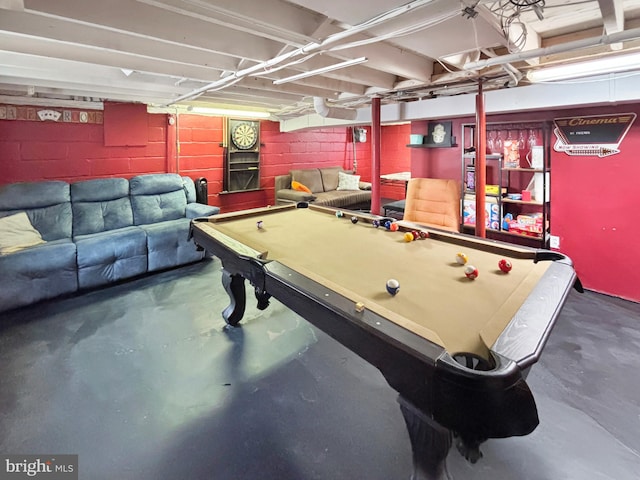 playroom with pool table and concrete flooring