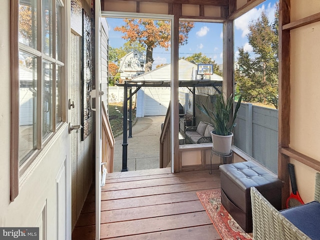 sunroom / solarium featuring plenty of natural light