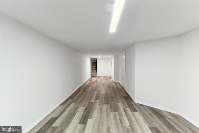 hallway featuring wood-type flooring