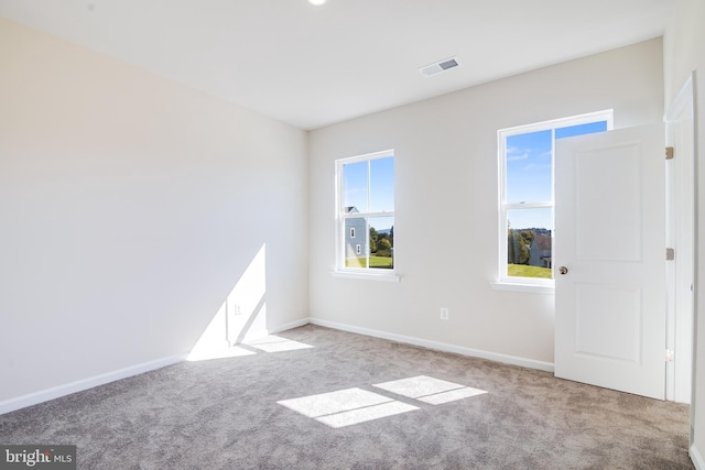 view of carpeted spare room