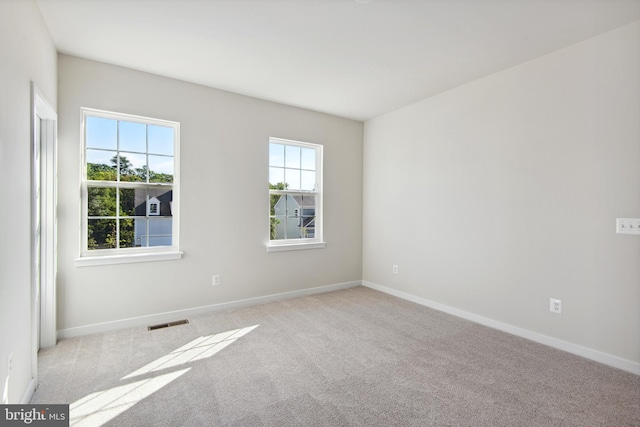 view of carpeted spare room