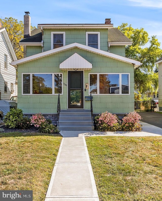 view of front of house with a front yard