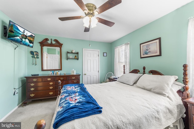 bedroom featuring carpet and ceiling fan