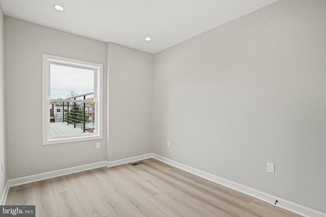 empty room featuring light hardwood / wood-style floors