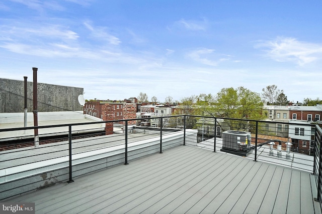 wooden terrace featuring central AC