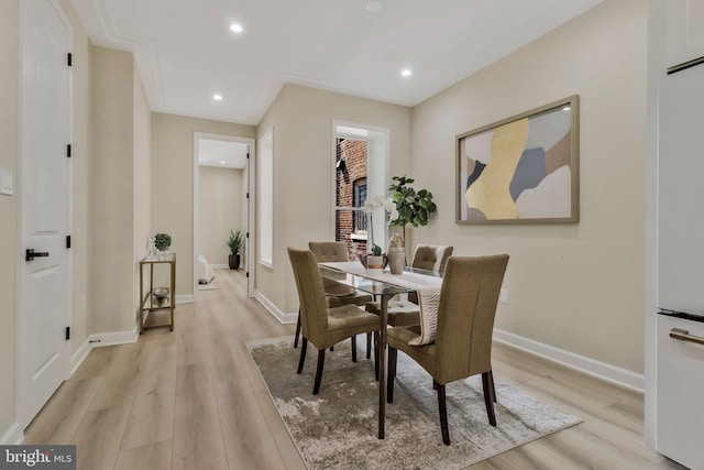 dining room featuring light hardwood / wood-style floors