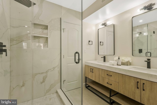 bathroom featuring vanity and walk in shower