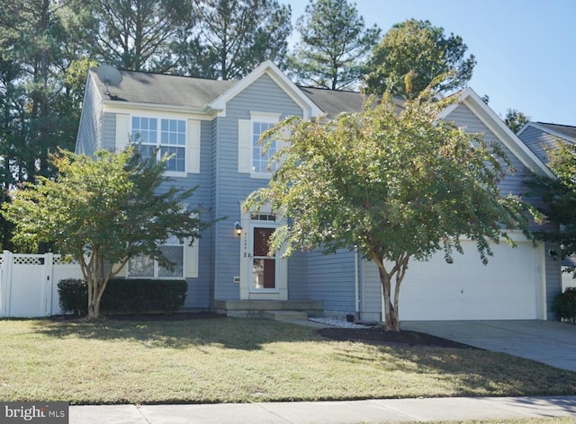 view of front of home with a garage and a front lawn