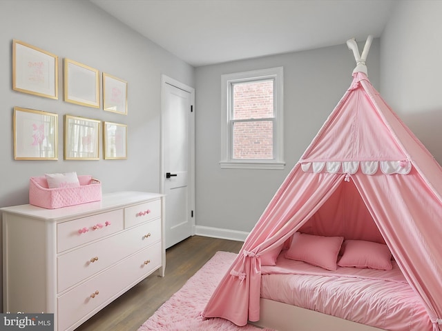 bedroom featuring dark wood-type flooring