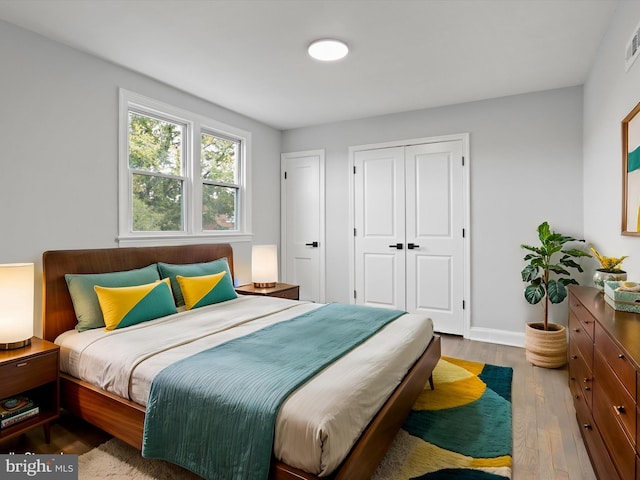 bedroom featuring light hardwood / wood-style floors