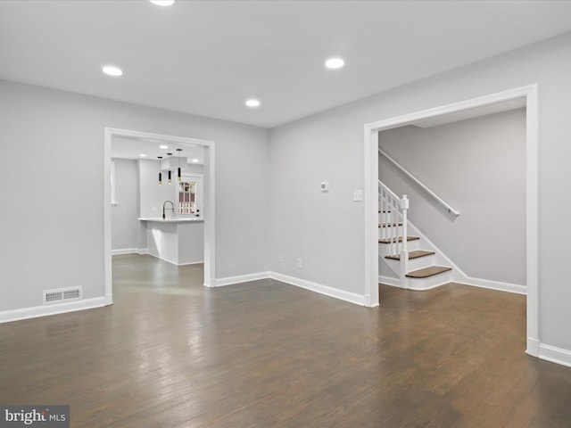 interior space featuring dark hardwood / wood-style floors and sink