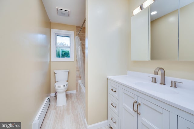 full bathroom featuring vanity, a baseboard radiator, shower / tub combo, and toilet