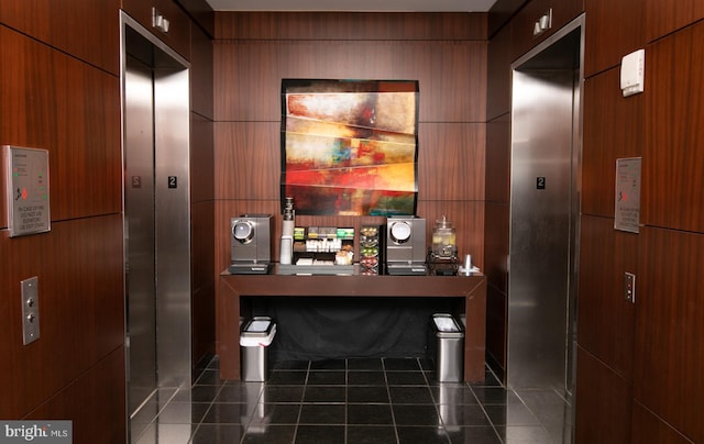 bar with dark tile patterned floors