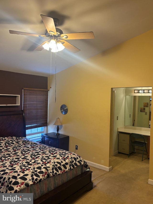 bedroom featuring light colored carpet and ceiling fan