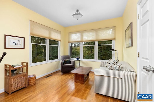 living area with wood-type flooring