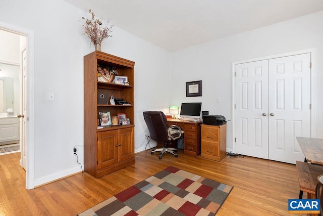 home office featuring light hardwood / wood-style flooring