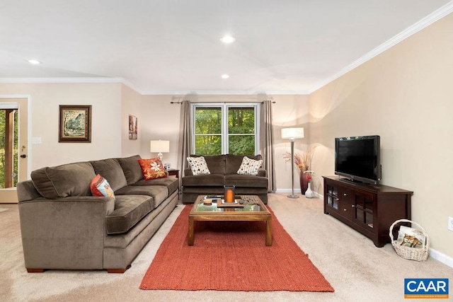 carpeted living room featuring ornamental molding