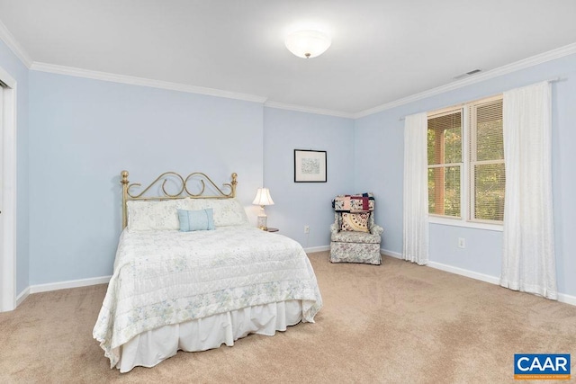 bedroom with crown molding and carpet floors