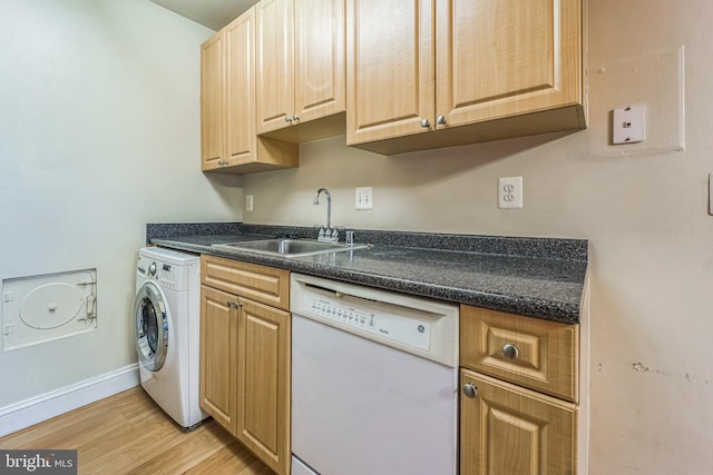 kitchen featuring dishwasher, light wood-type flooring, washer / clothes dryer, and sink