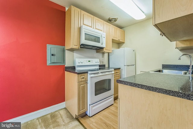 kitchen featuring sink, light hardwood / wood-style flooring, electric panel, white appliances, and light brown cabinetry