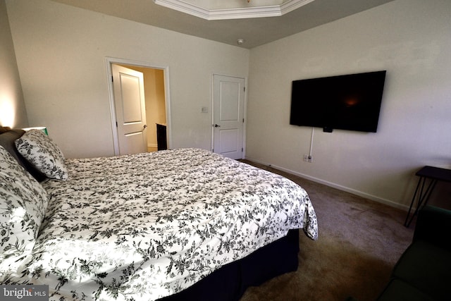 bedroom featuring ornamental molding and carpet floors