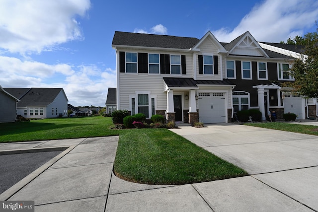 view of front of property with a front yard and a garage