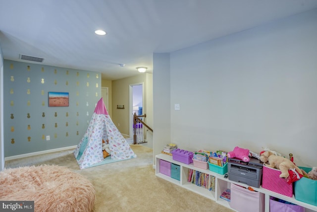 playroom featuring light colored carpet