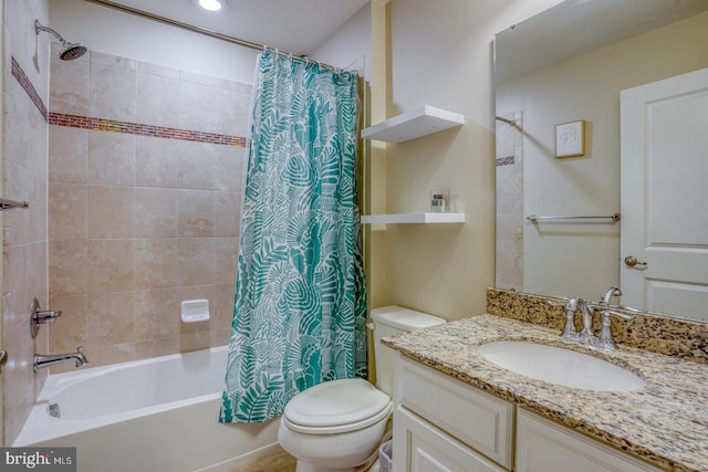 full bathroom featuring shower / bath combination with curtain, toilet, and vanity