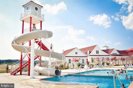 view of swimming pool featuring a water slide