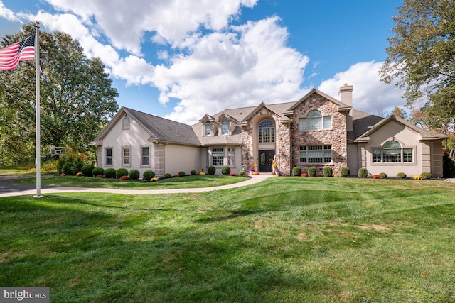 view of front of house with a front lawn