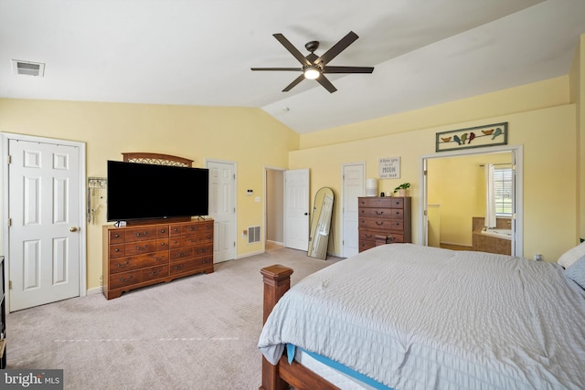 carpeted bedroom featuring vaulted ceiling and ceiling fan